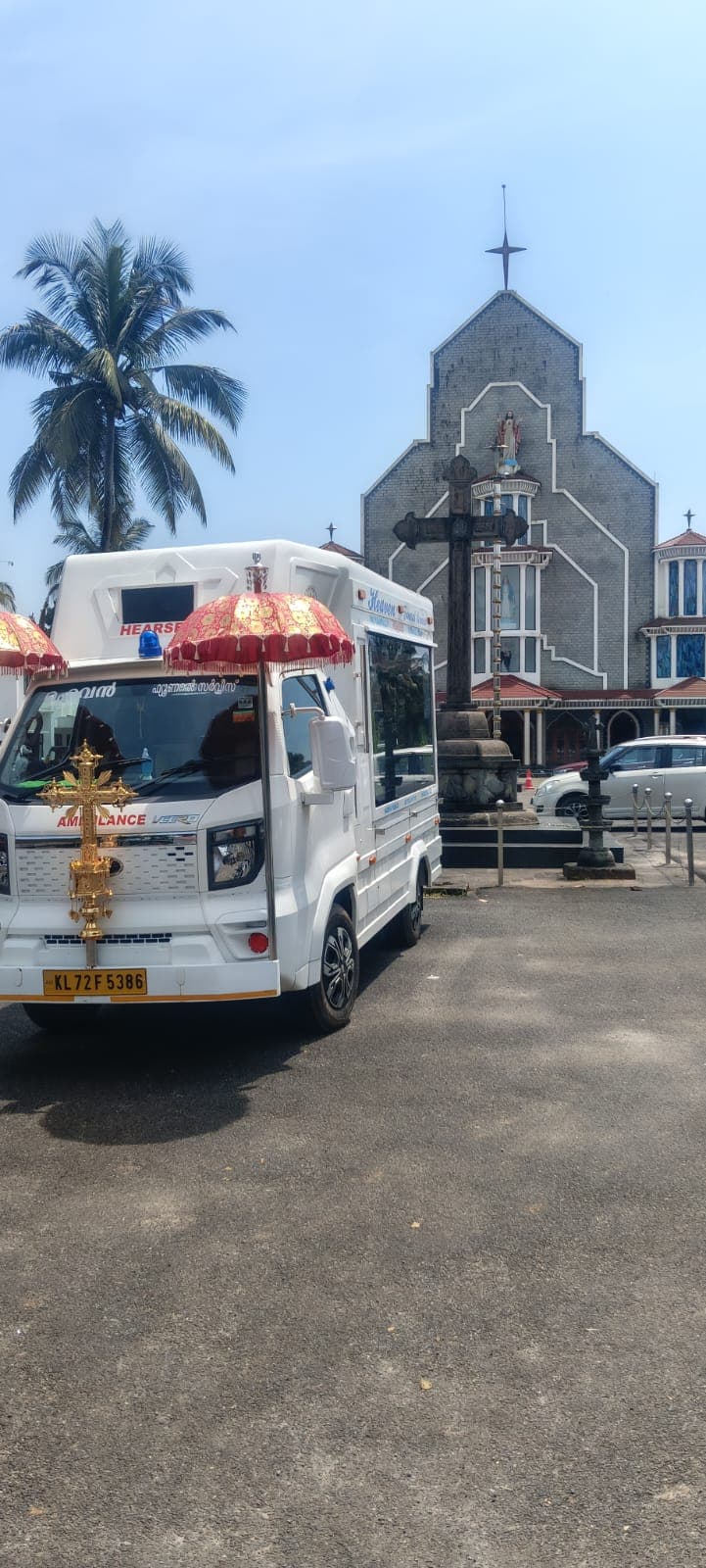 Heaven Funeral Services hearse van waiting outside a church at Payyampally, Mananthavady, Wayanad